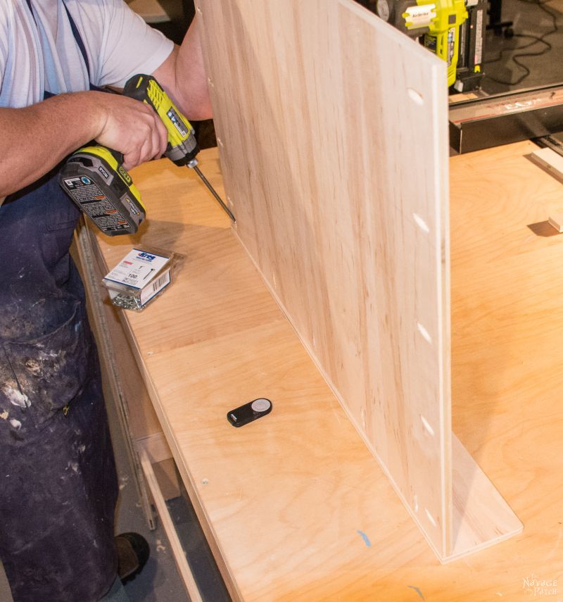 man building slide out shelves with pocket screws