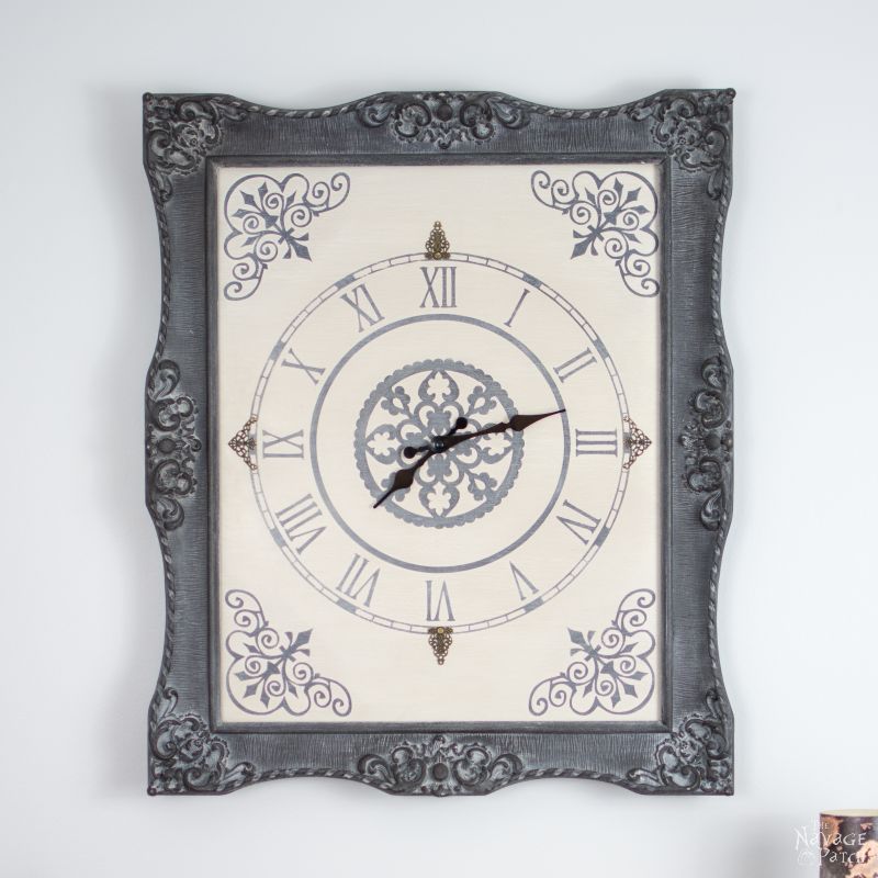 Ornate Frame to Wall Clock | Upcycled picture frame | How to make a wall clock from picture frame | DIY painted and stenciled wall clock | Homemade chalk paint recipe | DIY farmhouse style home decor | How to use white wax | Ornate picture frame makeover | How to build a stylish clock | How to stencil | TheNavagePatch.com