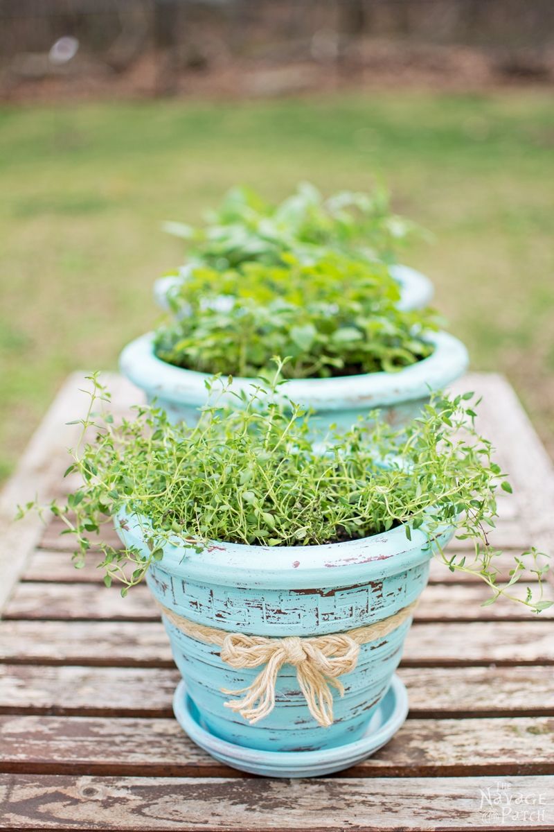 DIY flower pot makeover with homemade chalk paint | Painted, stenciled and distressed terracotta planters | Planter makeover with DIY chalk paint | Wet distressing method | #TheNavagePatch #DIY #Garden #Upcycle #ChalkPaint | Free paint color code | TheNavagePatch.com