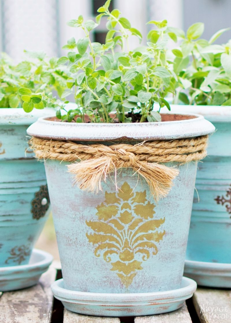 DIY flower pot makeover with homemade chalk paint | Painted, stenciled and distressed terracotta planters | Planter makeover with DIY chalk paint | Wet distressing method | #TheNavagePatch #DIY #Garden #Upcycle #ChalkPaint | Free paint color code | TheNavagePatch.com