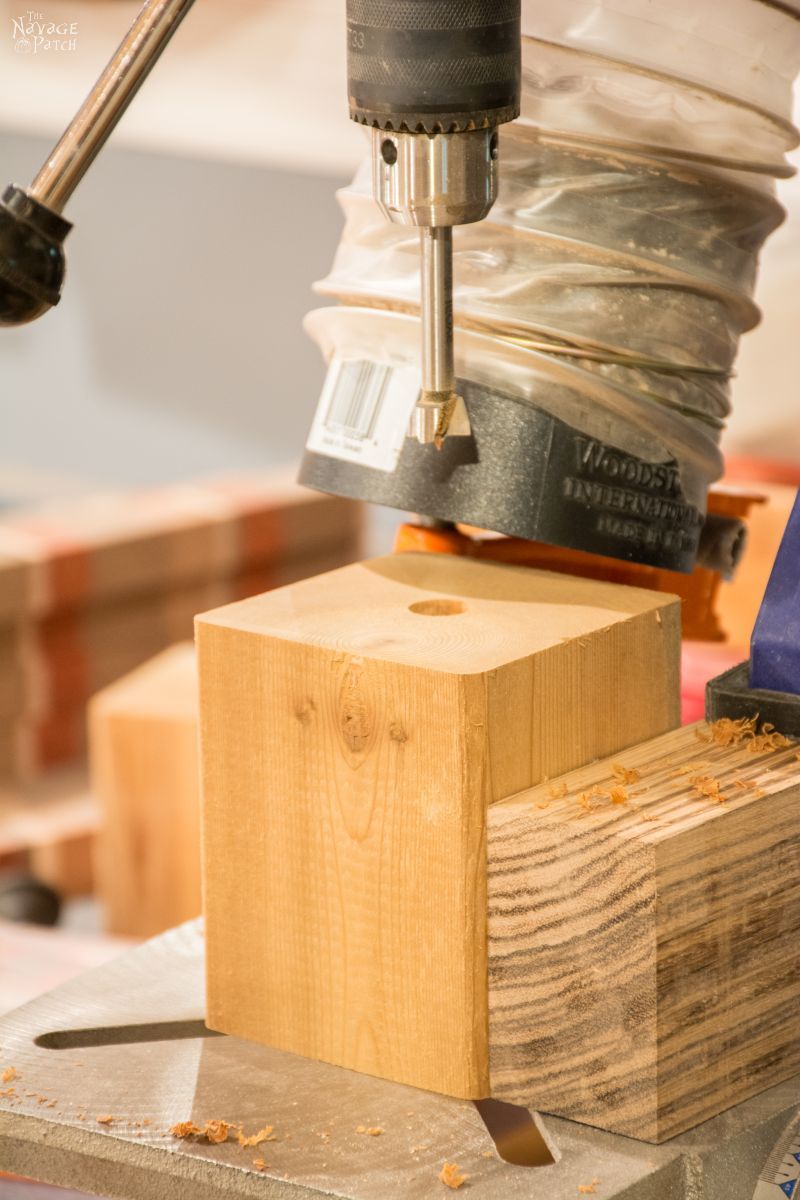 cedar cube with hole drilled in it