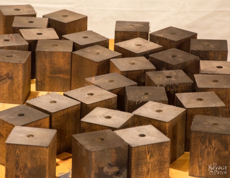assortment of cedar cubes stained dark brown