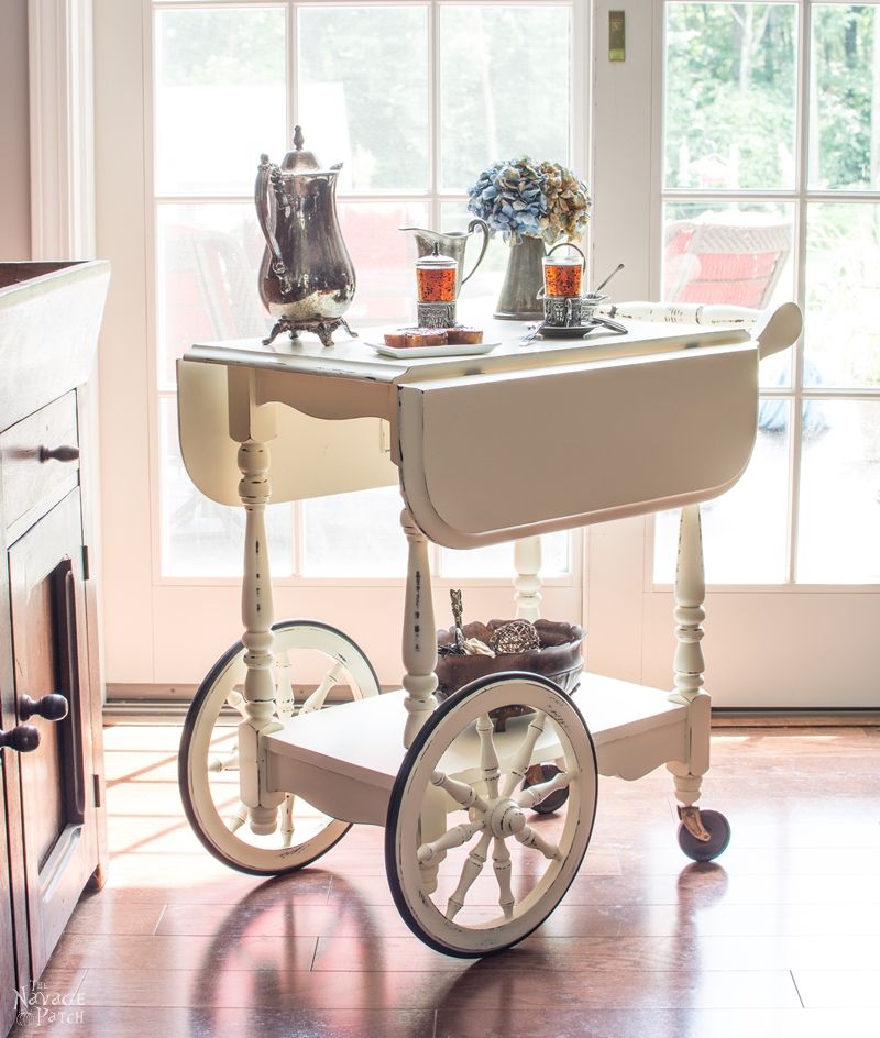 Tea Cart Makeover | DIY furniture makeover | DIY painted furniture with homemade chalk paint | DIY chalk paint | French country decorating | Farmhouse style furniture | Annie Sloan Old White color | How to use homemade chalk paint with paint sprayer | DIY chalk paint recipe | Wagner paint sprayer | Before & After | TheNavagePatch.com
