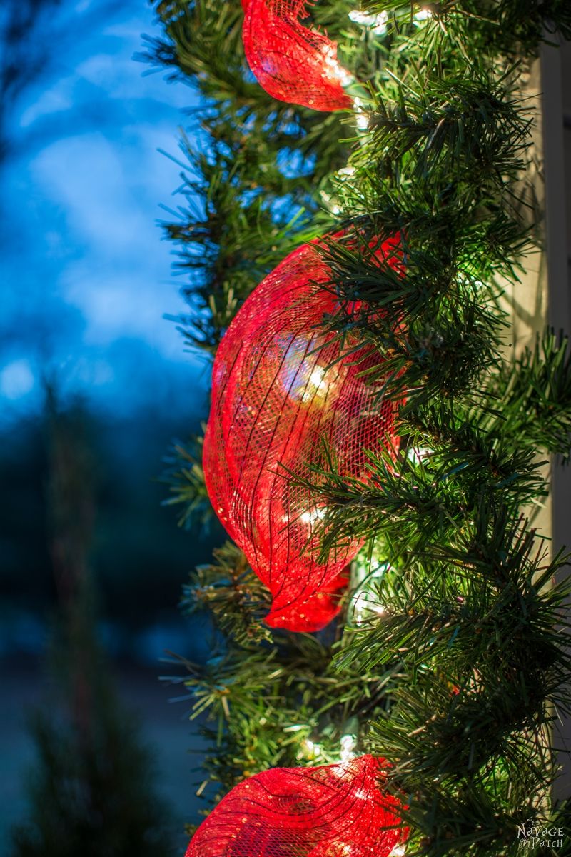 Faux Christmas Tree Repurposed into a DIY outdoor Christmas garland