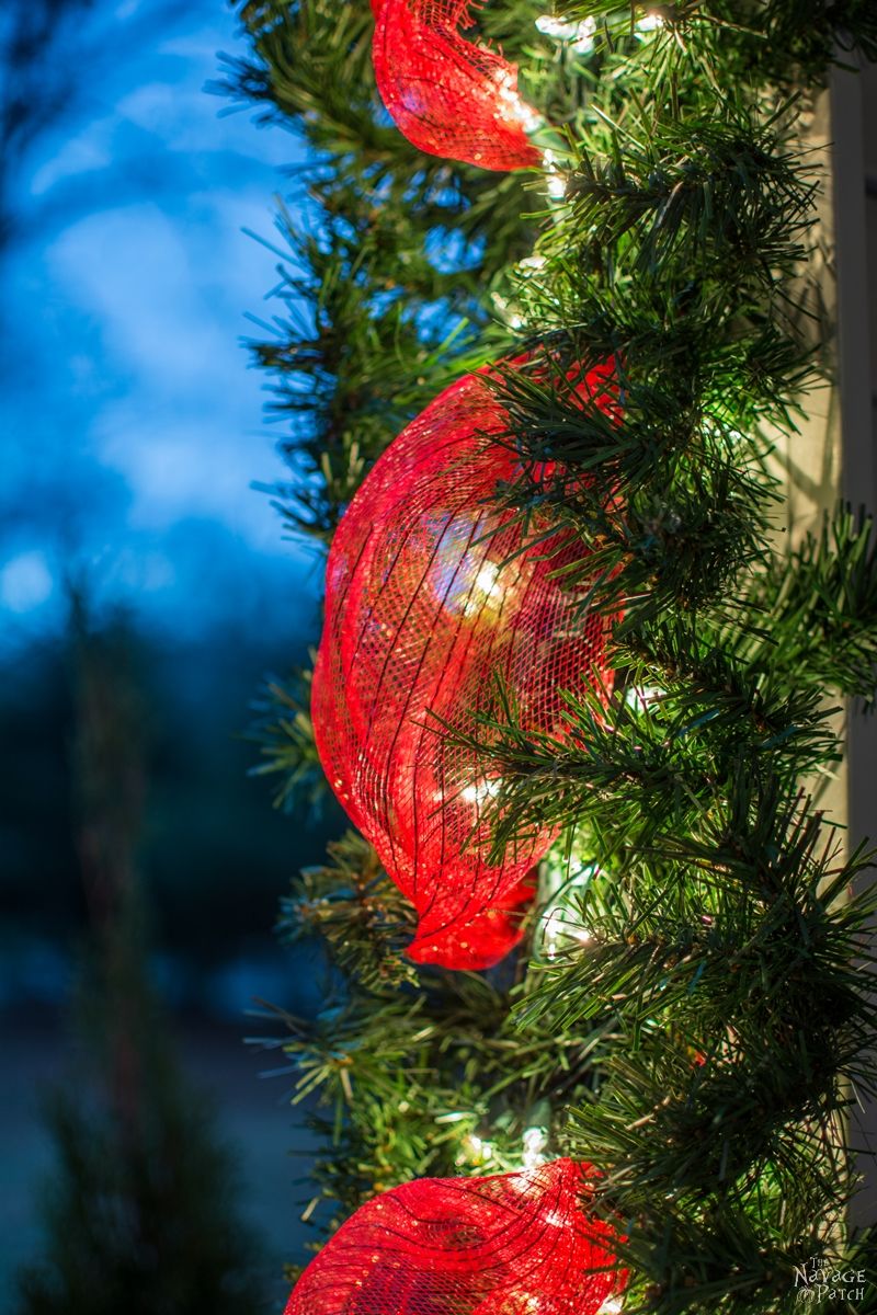 Faux Christmas Tree Repurposed into a DIY outdoor Christmas garland 