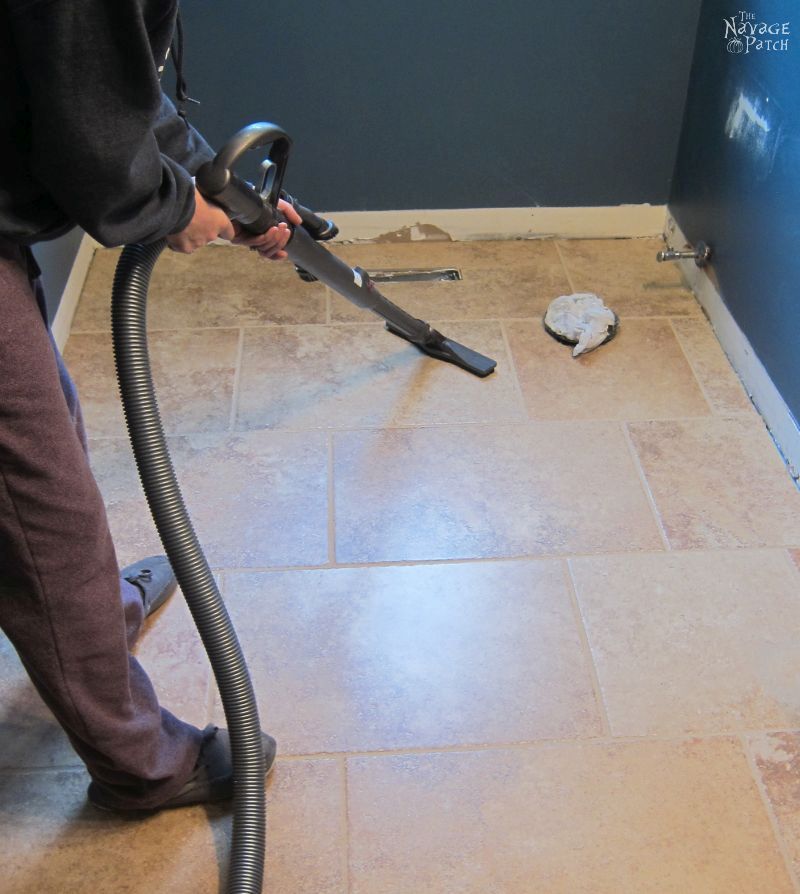 Guest Bathroom Renovation | How to tile a floor like a pro | DIY floor tiling | How to cut tiles | How to repair broken ceramic tiles | How to lay subfloor | DIY subflooring | How to grout tiles | DIY tile grouting and sealing | How to seal your tiles and grouting | DIY bathroom flooring | When to use concrete board as subfloor | How to choose grout color | DIY tile spacers | How to install ceramic tiles | DIY porcelain tiling | Before & After | TheNavagePatch.com
