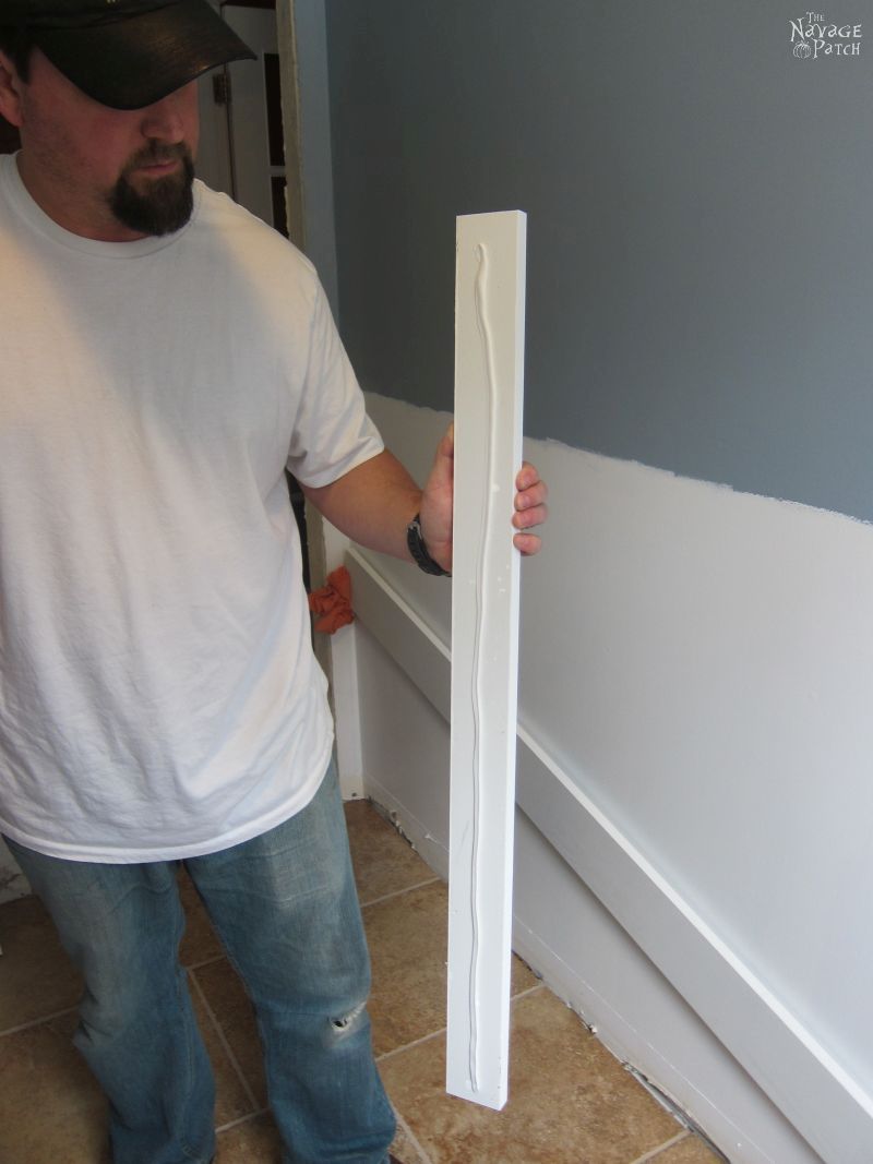 Guest Bathroom Renovation | How to install a toilet bowl | How to install wainscoting | How to install board and batten | DIY toilet bowl installation | DIY board and batten wainscoting | How to paint trim with no brush marks | How to paint windows | How to fix walls like a pro | DIY wall demolition | Best paint for bathrooms | Benjamin Moore Advance Paint | Before & After | TheNavagePatch.com