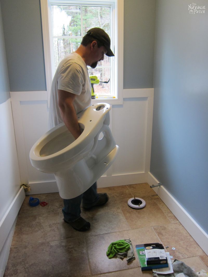 Guest Bathroom Renovation | How to install a toilet bowl | How to install wainscoting | How to install board and batten | DIY toilet bowl installation | DIY board and batten wainscoting | How to paint trim with no brush marks | How to paint windows | How to fix walls like a pro | DIY wall demolition | Best paint for bathrooms | Benjamin Moore Advance Paint | Before & After | TheNavagePatch.com