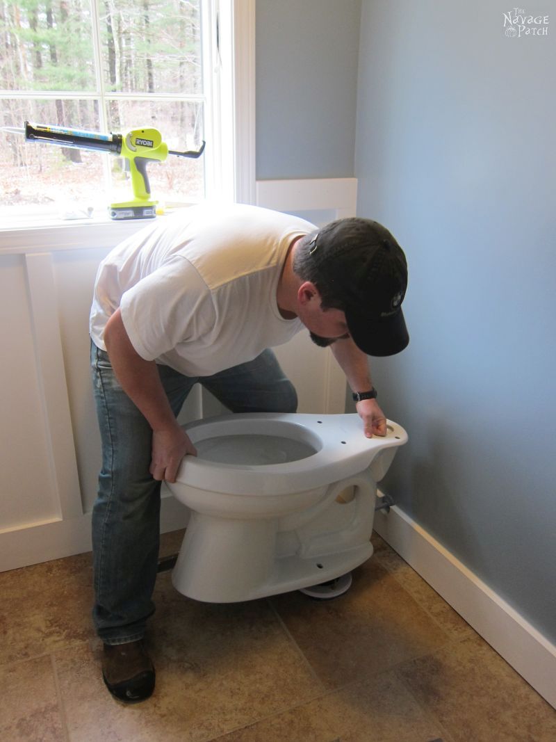 Guest Bathroom Renovation | How to install a toilet bowl | How to install wainscoting | How to install board and batten | DIY toilet bowl installation | DIY board and batten wainscoting | How to paint trim with no brush marks | How to paint windows | How to fix walls like a pro | DIY wall demolition | Best paint for bathrooms | Benjamin Moore Advance Paint | Before & After | TheNavagePatch.com