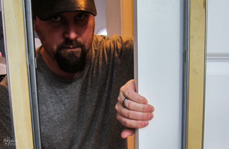 Guest Bathroom Renovation | DIY pocket door installation | How to install a pocket door | How to cut a door opening in a wall | How to make a door opening |How to paint a door | Before and After | TheNavagePatch.com