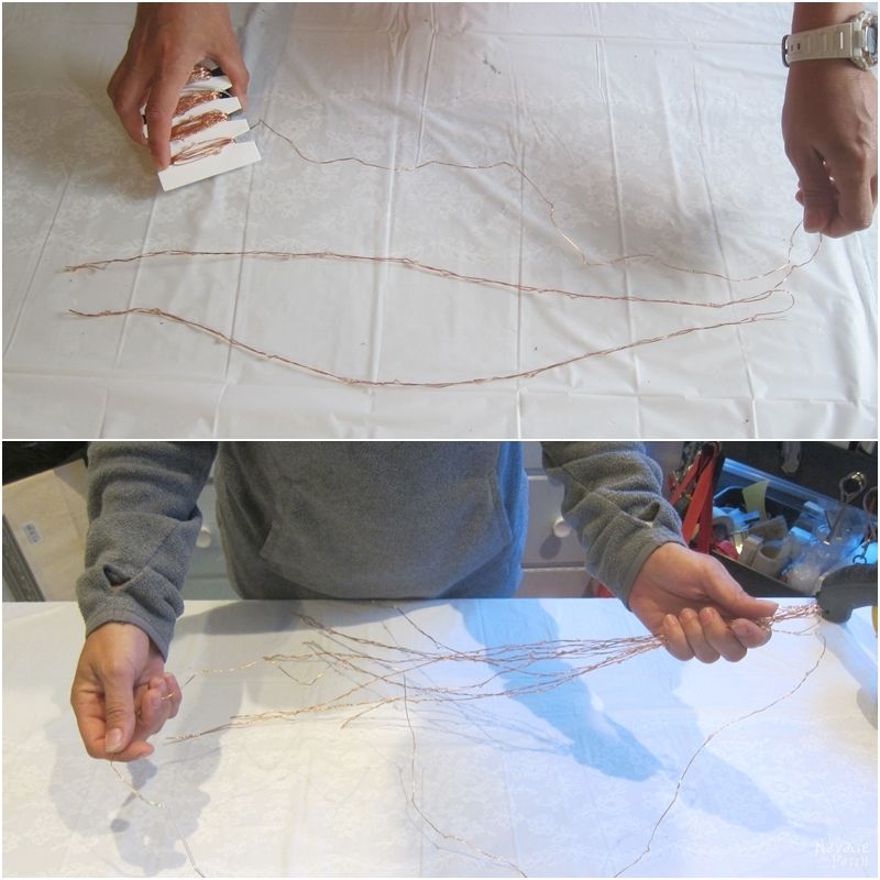 woman gathering wound bunches of solar string lights