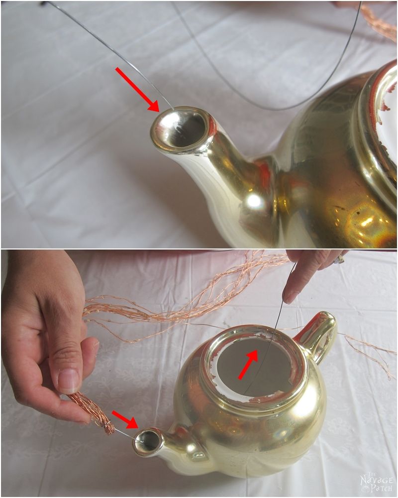 inserting craft wire into the spout of a teapot