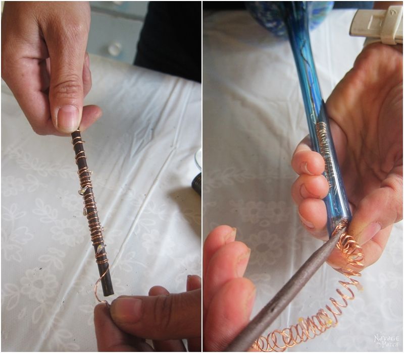 solar fairy lights wound around a rod and then inserted into watering globe.