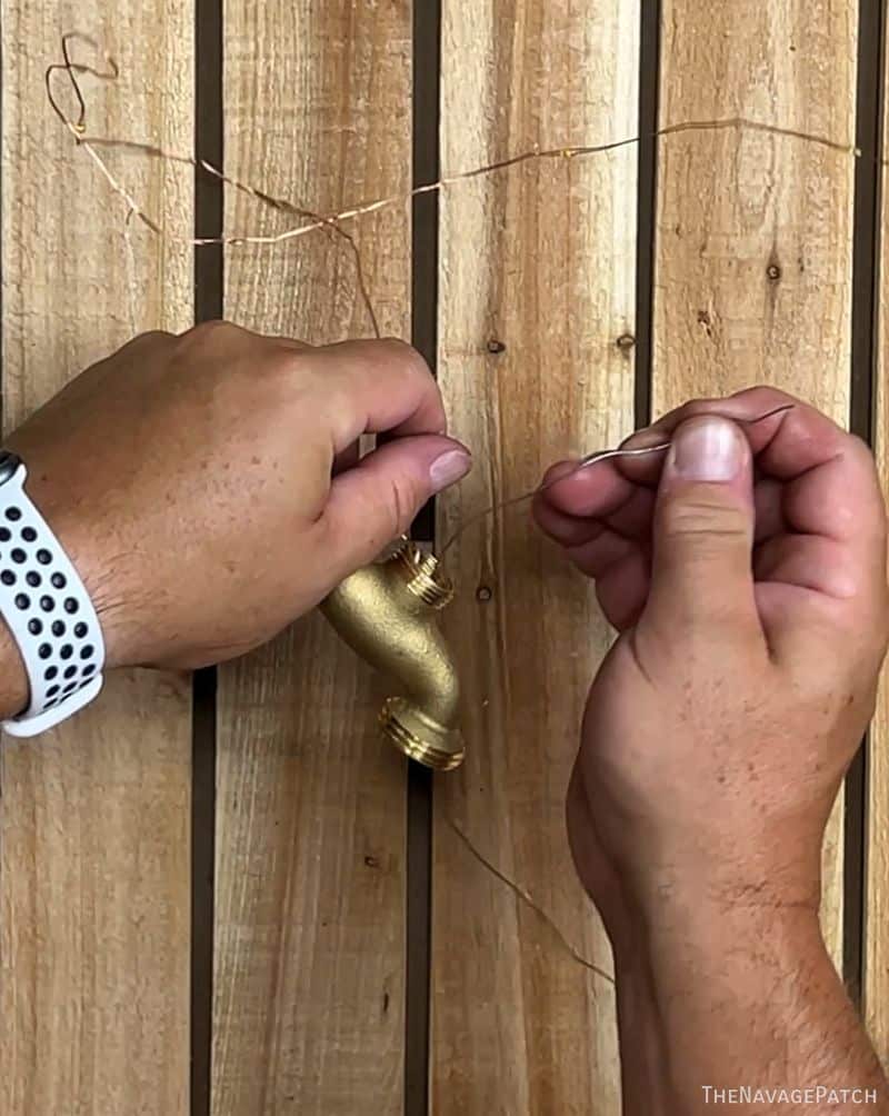 man making waterdrop solar lights