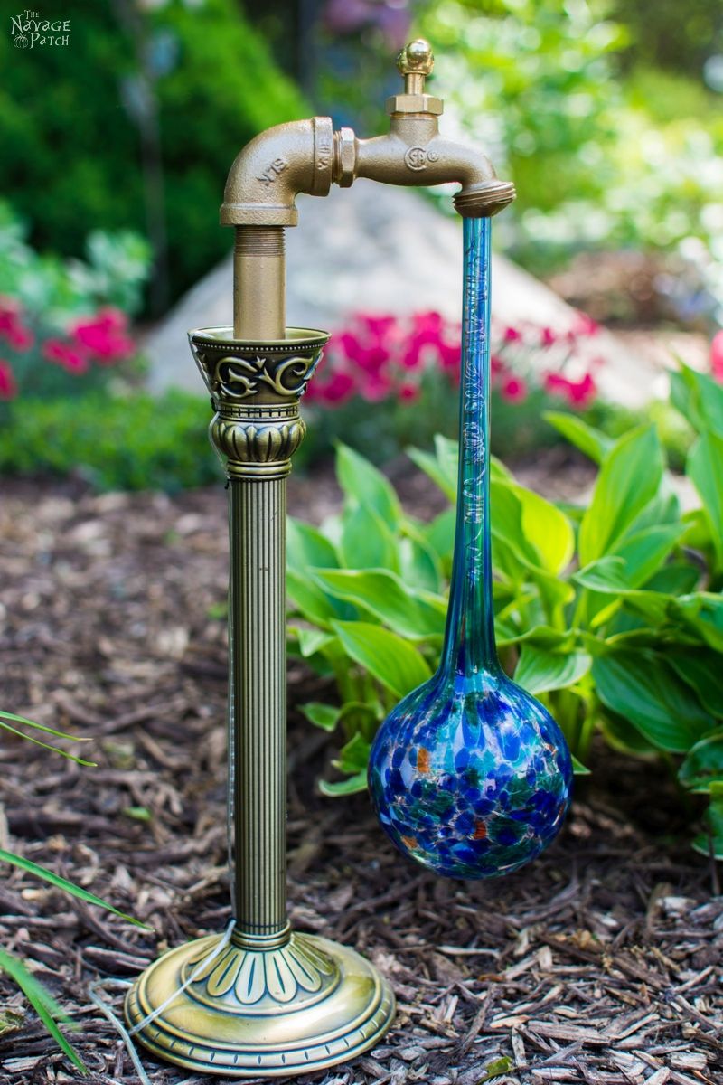 side view of waterdrop garden light in a garden during the day