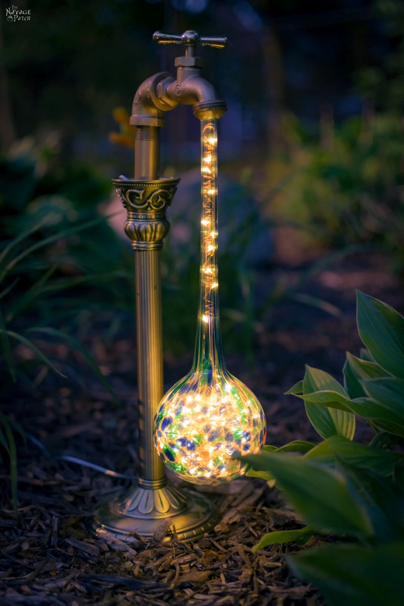 waterdrop solar light in a garden at night