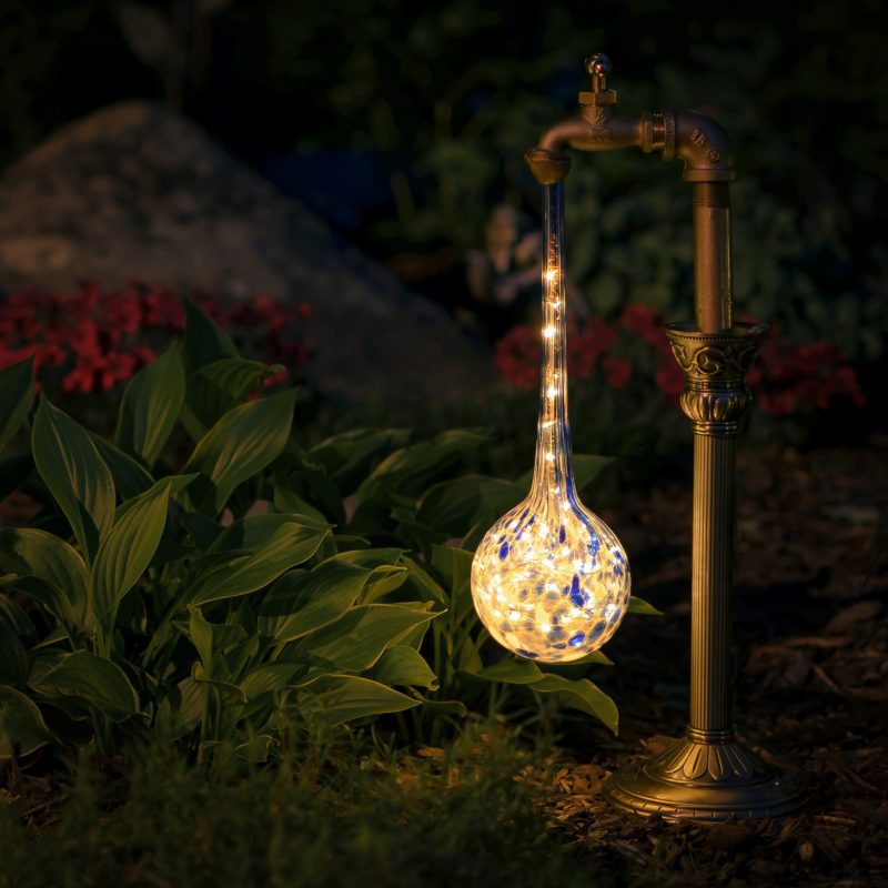 DIY Waterdrop Solar Lights | Step-by-step tutorial for DIY waterdrop solar lights | Upcycled candle sticks | Upcycled plant watering globes | DIY whimsical garden lights | #TheNavagePatch #DIY #Upcycled #SolarLights | Easy, budget friendly DIY backyard ornaments and landscape lights | TheNavagePatch.com