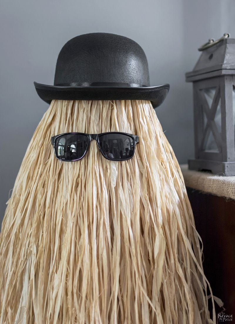 Cousin Itt Halloween prop | DIY Addams Family Cousin It | Step-by-step tutorial for how to make a Cousin It | DIY Halloween decor with Dollar store supplies | Upcycled and Repurposed Halloween decor | Upcycled tomato cage to Halloween decoration | #TheNavagePatch #Upcycle #Repurposed #halloweendecorations #halloween #DollarStore #DollarTree #easydiy #DIY #halloweenparty #Cousinit | TheNavagePatch.com