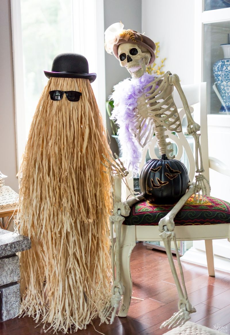 Cousin Itt Halloween prop | DIY Addams Family Cousin It | Step-by-step tutorial for how to make a Cousin It | DIY Halloween decor with Dollar store supplies | Upcycled and Repurposed Halloween decor | Upcycled tomato cage to Halloween decoration | #TheNavagePatch #Upcycle #Repurposed #halloweendecorations #halloween #DollarStore #DollarTree #easydiy #DIY #halloweenparty #Cousinit | TheNavagePatch.com