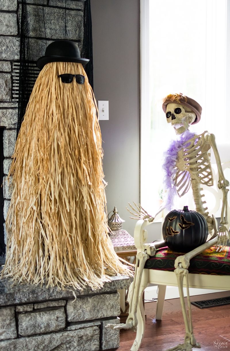 Cousin Itt Halloween prop | DIY Addams Family Cousin It | Step-by-step tutorial for how to make a Cousin It | DIY Halloween decor with Dollar store supplies | Upcycled and Repurposed Halloween decor | Upcycled tomato cage to Halloween decoration | #TheNavagePatch #Upcycle #Repurposed #halloweendecorations #halloween #DollarStore #DollarTree #easydiy #DIY #halloweenparty #Cousinit | TheNavagePatch.com