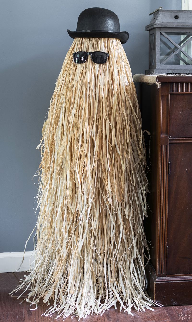 Cousin Itt Halloween prop | DIY Addams Family Cousin It | Step-by-step tutorial for how to make a Cousin It | DIY Halloween decor with Dollar store supplies | Upcycled and Repurposed Halloween decor | Upcycled tomato cage to Halloween decoration | #TheNavagePatch #Upcycle #Repurposed #halloweendecorations #halloween #DollarStore #DollarTree #easydiy #DIY #halloweenparty #Cousinit | TheNavagePatch.com