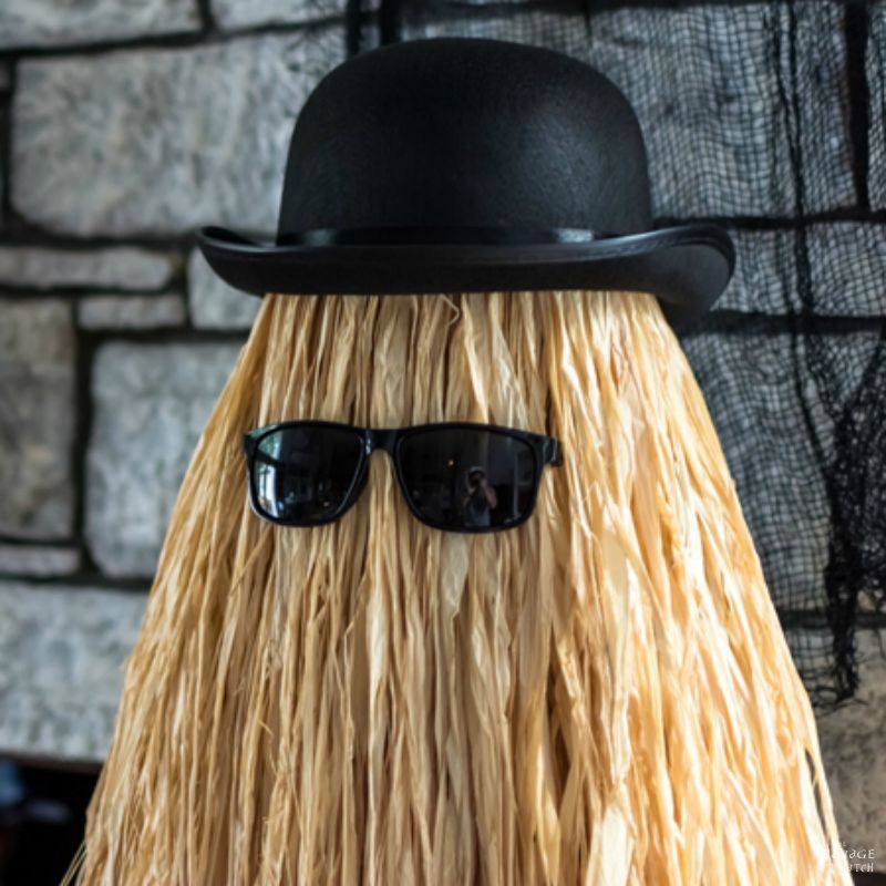 Cousin Itt Halloween prop | DIY Addams Family Cousin It | Step-by-step tutorial for how to make a Cousin It | DIY Halloween decor with Dollar store supplies | Upcycled and Repurposed Halloween decor | Upcycled tomato cage to Halloween decoration | #TheNavagePatch #Upcycle #Repurposed #halloweendecorations #halloween #DollarStore #DollarTree #easydiy #DIY #halloweenparty #Cousinit | TheNavagePatch.com