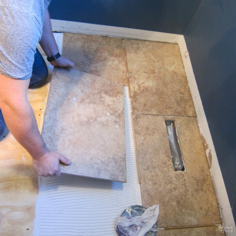 Guest Bathroom Renovation | How to tile a floor like a pro | DIY floor tiling | How to cut tiles | How to repair broken ceramic tiles | How to lay subfloor | DIY subflooring | How to grout tiles | DIY tile grouting and sealing | How to seal your tiles and grouting | DIY bathroom flooring | When to use concrete board as subfloor | How to choose grout color | DIY tile spacers | How to lay tiles | DIY tile installation | How to install ceramic tiles | DIY porcelain tiling | Before & After | DIY Bathroom Renovation | TheNavagePatch.com