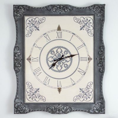 Ornate Frame to Wall Clock | Upcycled picture frame | How to make a wall clock from picture frame | DIY painted and stenciled wall clock | Homemade chalk paint recipe | DIY farmhouse style home decor | How to use white wax | Ornate picture frame makeover | How to build a stylish clock | How to stencil | TheNavagePatch.com