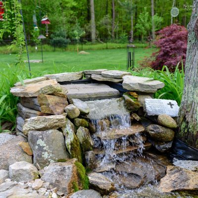 The Pond Project – Two Years Later | DIY pond and backyard makeover | DIY Pond and garden landscaping ideas | Tips on landscaping a lush garden | Plants that work great in pond landscaping | Almost no-maintenance plants for your sun garden | How to easily maintain a pond | What to plant around a pond | Pond and backyard reveal | #TheNavagePatch #DIY #Pond #Landscaping #Garden #HowTo | TheNavagePatch.com