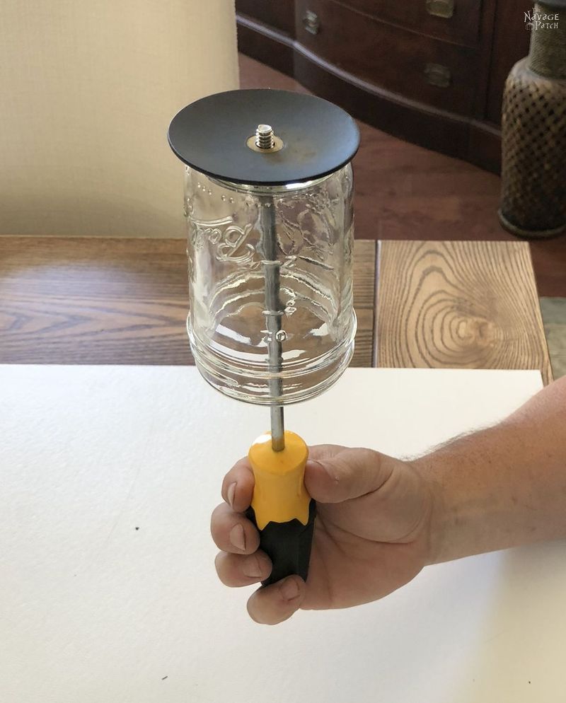 Solar Mason Jar Lights | DIY outdoor solar lights | Upcycled mason jar solar lights | How to drill glass easily | How to easily drill ceramic | DIY outdoor solar sconces from mason jars | DIY outdoor sconces | DIY Porch lighting | Repurposed mason jars | #TheNavagePatch #DIY #SolarLights #MasonJars #easydiy #masonjarlights #Lighting #Upcycled # Repurposed #HowTo #CurbAppeal #Porchdecor #farmhouse #farmhousestyle | TheNavagePatch.com