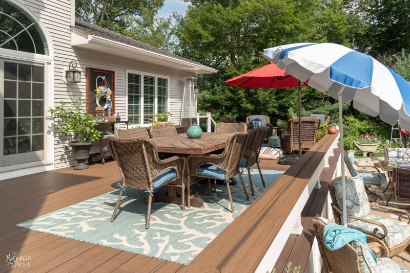 Deck Reveal | Deck decor ideas with source list | Trex Deck design ideas | How to choose a decking material | Composite deck vs pressure treated wooden decks | Trex Deck Vintage Lantern and Spiced Rum | #thenavagepatch #deck #outdoors #homedecor #diy #trex #trexdeck #deckdesign | TheNavagePatch.com