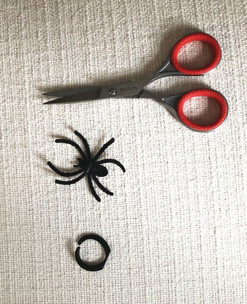 DIY Halloween Wreath (an Easy 10-Minute Craft) | Quick and easy DIY spider wreath with Dollar Store supplies | Upcycled embroidery hoop wreath | Upcycled and Repurposed Halloween decor | #TheNavagePatch #Upcycled #halloweendecorations #halloween #easydiy #DIY #DollarTree #DollarStore #halloweencrafts #spiders #halloweenparty | TheNavagePatch.com