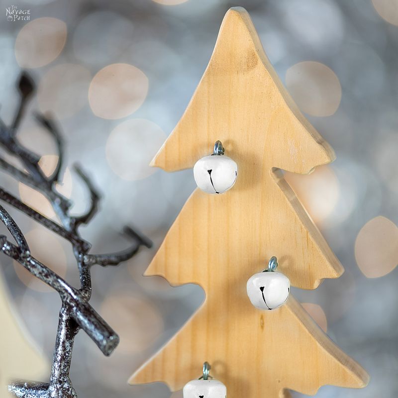 DIY Wood Alpine Tree with Jingle Bells | DIY Wooden Jingle Bell Trees with free tree pattern | How to make a wooden tree | DIY rustic wooden Christmas tree | #TheNavagePatch #easydiy #Christmas #Upcycled #DIY #freeprintable #treetemplate #treepattern #Holidaydecor #DIYChristmas #Christmascrafts #DIYHomedecor #Holidays #Alpinetree #Christmastree | TheNavagePatch.com