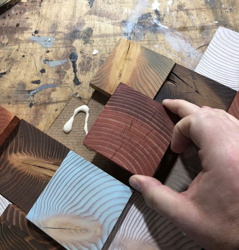 gluing stained wood slices onto tempered hardboard