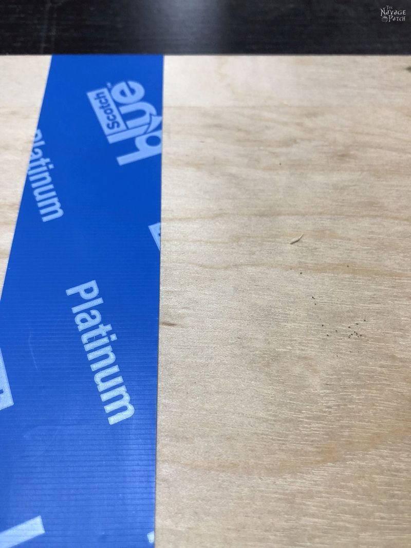 blue tape on plywood