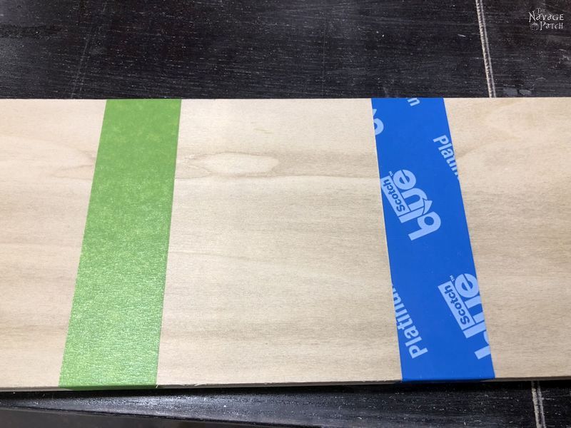 plywood with green and blue painter's tape