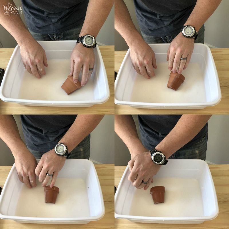 rolling a terra cotta pot through baking soda and water