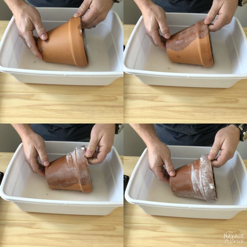 rolling a terra cotta pot through baking soda and water