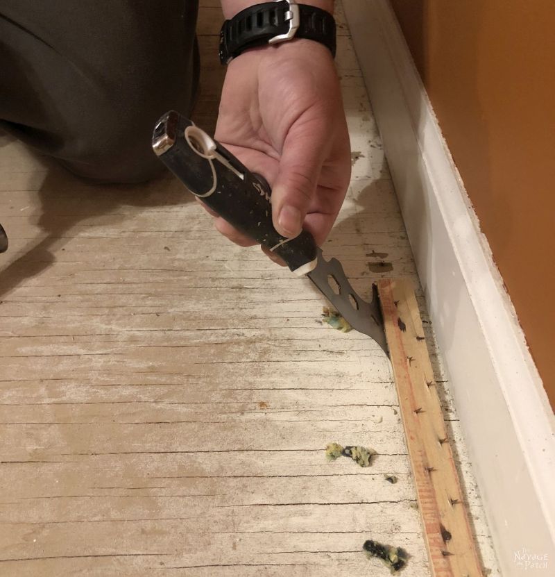 prying up a carpet tack strip