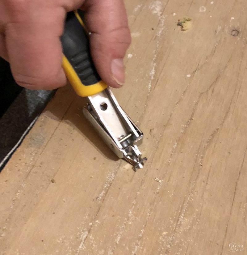 lifting carpet staples with a construction staple remover