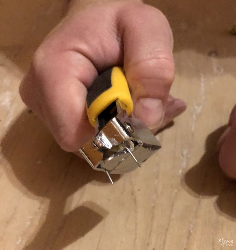 lifting carpet staples with a construction staple remover