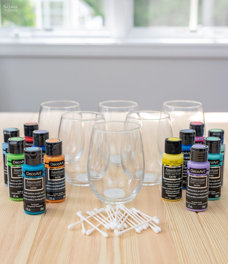 stemless wine glasses and decoart multi-surface paint on a table