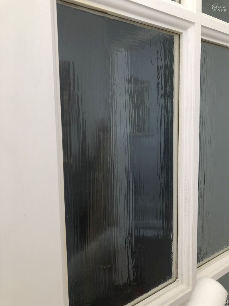 dried masking liquid on a french door pane