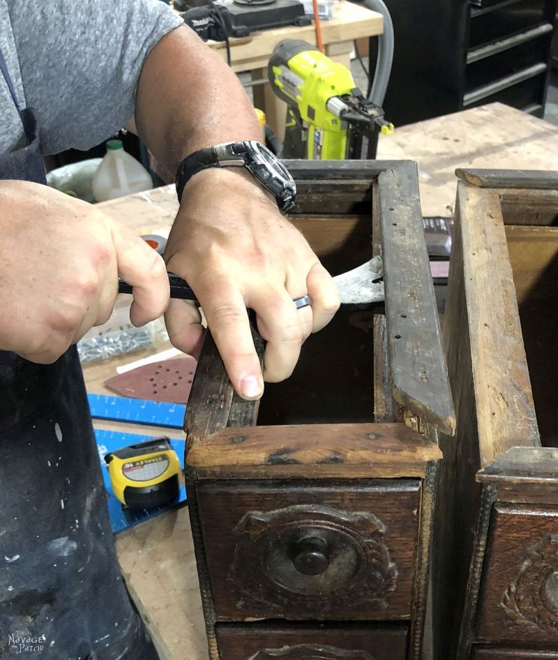 working on an antique sewing machine drawer upcycle