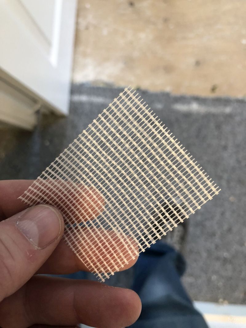 square piece of drywall tape