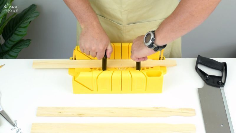 locking wood in a miter box