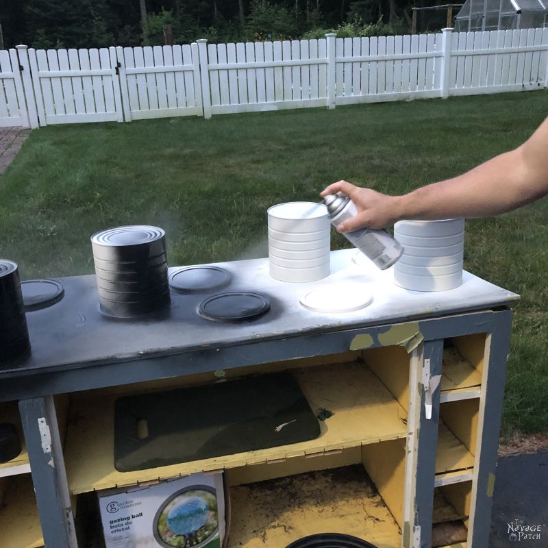 spray painting coffee cans