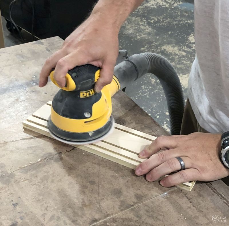 sanding pieces for a diy craft paint storage rack