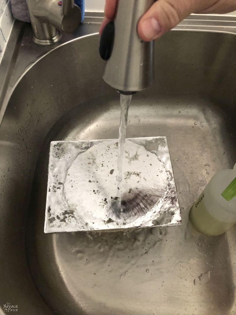 rinsing bleach off an antiqued mirror