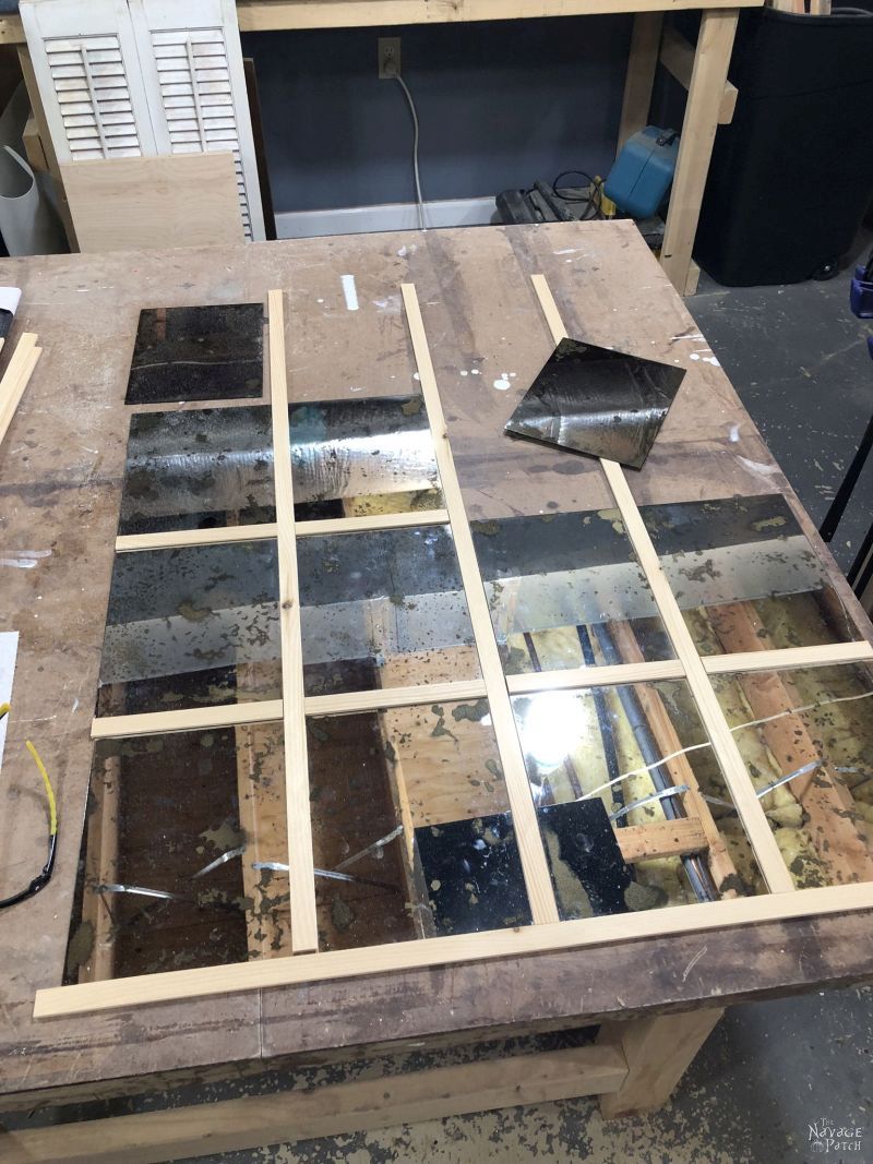 antiqued mirror panels on a table